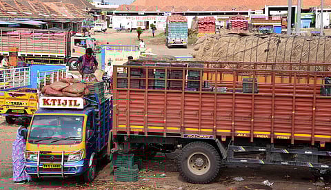 Traders clearing the stocks at koyembedu vegetable wholesale market, as the market will be shifted to Thirumazhisai, in Chennai. (Photo| R Satish Babu, EPS)