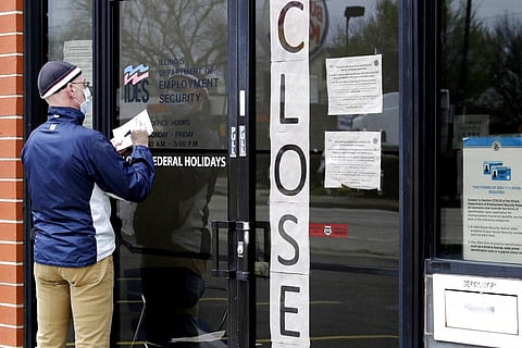 U.S. businesses cut an unprecedented 20.2 million jobs in April, an epic collapse with coronavirus outbreak closing the offices, factories, schools, construction sites and stores that propel the U.S. economy. (Photo | AP)