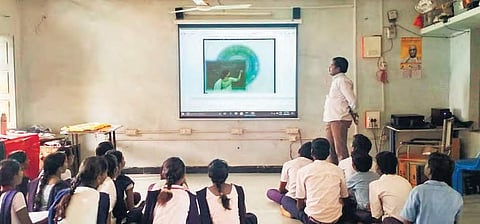 Students attend digital classes at one of the govt schools. (Photo | EPS)
