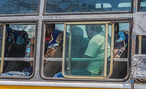 A bus carries migrant labourers from Khordha Road Railway Station to their respective destination in Bhubaneswar. (Photo | Biswanath Swain, EPS)