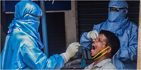 A health worker collecting swab sample. (File photo | Biswanath Swain, EPS)
