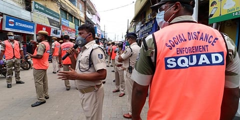 Police officials in Bhubaneswar create awareness on social distancing. (Photo| EPS)