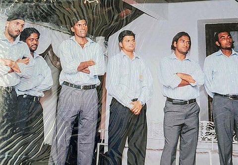 Dhoni is seen with the likes of Harbhajan Singh, Suresh Raina, L. Balaji and Venugopal Rao, all of them clad in formals.