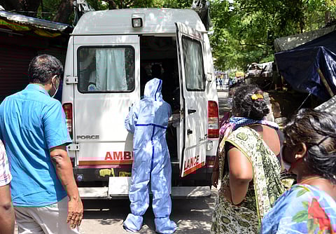 Chennai people who are tested positive for coronavirus has been taken to hospital at Kannappar Thidal Periyamet in Chennai on Friday. (Photo | R Sathish Babu/EPS)