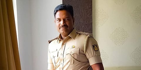 Madanayakanahalli police inspector KP Sathyanarayan. (Photo| Special Arrangement)