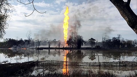 Fire flames continue to erupt from the gas well of Oil India Ltd at Baghjan in Assam's Tinsukia district. (Photo| ANI)