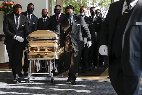 Pallbearers bring the coffin into The Fountain of Praise church in Houston for the funeral for George Floyd on Tuesday, June 9, 2020. (Photo | AP)