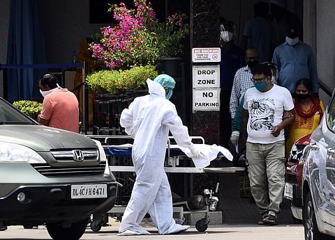 A medical worker in PPE kit at the emergency ward at sant Parmanand hospital in New Delhi . (Photo | Parveen Negi, EPS)