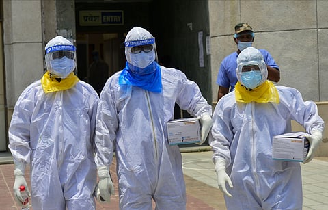 Medics arrive to take samples of suspected COVID-19 patients for lab tests at a government hospital during the ongoing nationwide lockdown to curb the spread of coronavirus in New Delhi Wednesday June 10 2020. (Photo | PTI)