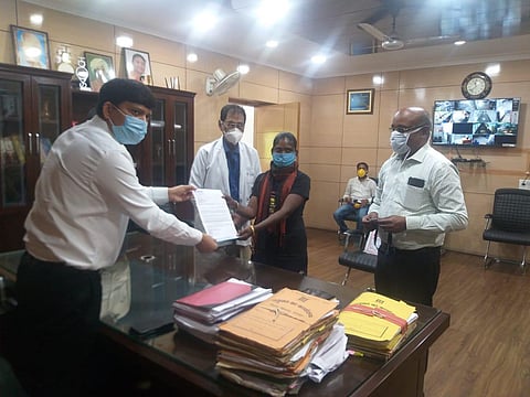Khatoon receiving the appointment letter from the Deputy Commissioner (Photo | EPS)