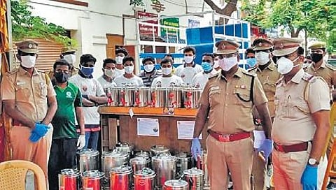 Police and volunteers prepare provisions to help affected families in Chennai