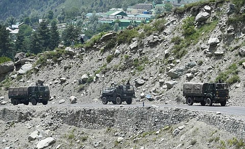 An army convoy moves along the Srinagar-Leh National highway in Ganderbal district of Central Kashmir. (Photo | PTI)