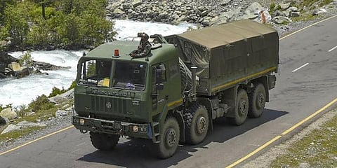 An Army convoy moves along the Srinagar-Leh National highway. (Photo | PTI)