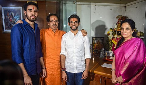 Shiv Sena leader Aditya Thackeray with his brother Tejas Thackeray (L), father Uddhav Thackery (second left) and mother Rashmi Thackeray (R) after winning the assembly elections at Sena Bhavan in Mumbai. (Photo | PTI)