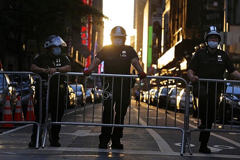 Police officers keep people out of Times Square in New York, Monday, June 1, 2020. Demonstrators took to the streets of New York City to protest the death of George Floyd, a black man who was killed in police custody in Minneapolis on May 25. (Photo | AP)