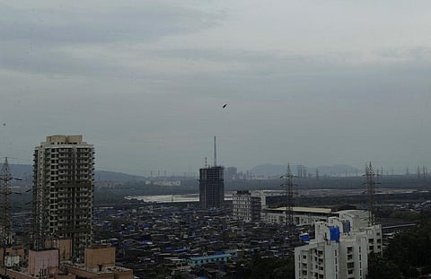 Dark clouds gather over the skyline in Mumbai as a cyclone in the Arabian Sea is barreling toward India's business capital, threatening to deliver high winds and flooding to an area already struggling with the nation's highest number of coronavirus infect