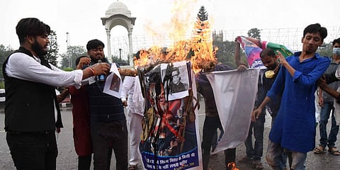 Fans of late actor Sushant Singh Rajput stage a demonstration against actor Salman Khan and filmmaker Karan Johar in Patna. (Photo| IANS)