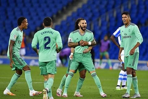Real Madrid's Karim Benzema celebrates his goal during the Spanish La Liga soccer match between Real Sociedad and Real Madrid at Anoeta stadium, San Sebastian, Spain. (Photo | AP)