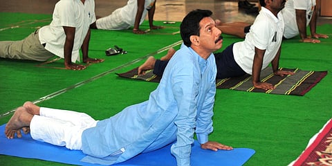 Karnataka BJP president Nalinkumar Kateel performs yoga to mark the 6th International Yoga Day in Bengaluru. (Photo| EPS)