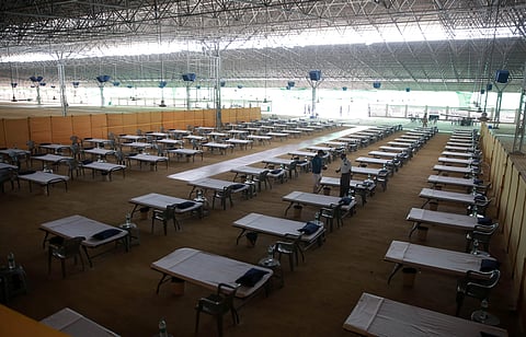 Volunteers prepare a facility that can accommodate more than ten thousand COVID-19 patients at the Radha Soami Satsang Beas complex in the Chattarpur area of New Delhi. (Photo | Shekhar Yadav/EPS)
