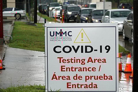 Cars are lined up at a United Memorial Medical Center COVID-19 testing site Wednesday, June 24, 2020, in Houston. (Photo | AP)