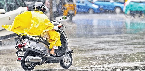 A motorist drives amid heavy rain in Bengaluru on Thursday. Heavy rain lashed the city, flooding roads and low-lying areas. As per the Karnataka State Natural Disaster Monitoring Centre, the city witnessed 39 mm rainfall on Thursday. As per the weather fo