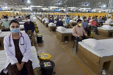 ITBP personnel and health workers inside the Sardar Patel COVID Care Centre and Hospital in New Delhi Saturday June 27 2020. (Photo | PTI)