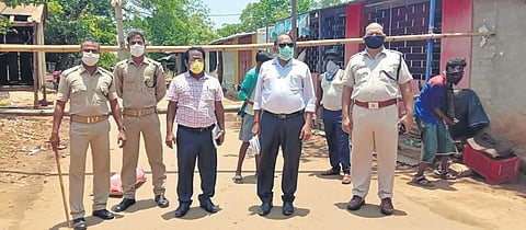 Officials supervising sealing of Bramhapura panchayat I EXPRESS