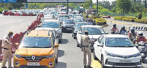 At the Delhi-Noida border several commuters were stuck on the DND flyway on Tuesday (Photo | Parveen Negi, EPS)