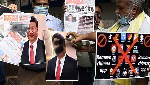 Members of Working Journalists Association of India (Delhi Unit) stage a protest against China demanding boycott of Chinese products and newspaper Global times, at Press Club of India, in New Delhi. (Photo | Parveen Negi, EPS)