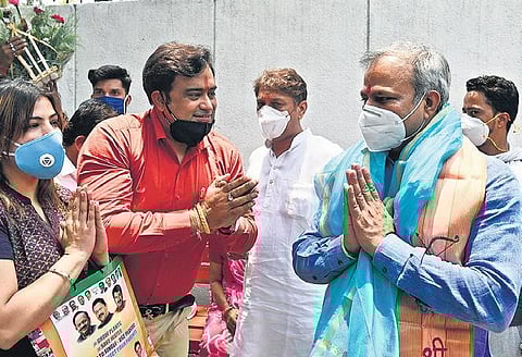 Adesh Kumar Gupta, newly appointed Delhi BJP chief, being facilitated by party workers at his office in West Patel Nagar on Wednesday | Parveen Negi