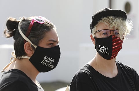Demonstrators protest under the slogan Black Lives Matter, outside parliament in Cape Town, South Africa. (Photo | AP)