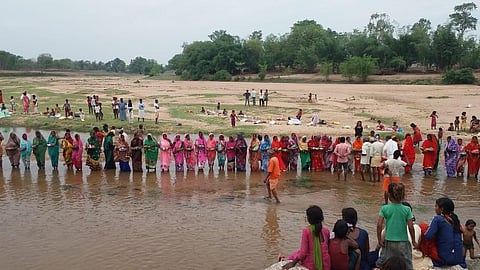 Women peforming puja to please 'Corona Mai' (Photo | EPS)