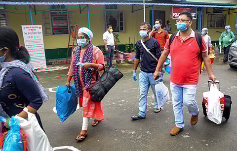 Patients recovered from COVID-19 leave after being discharged from Tinsukia Civil Hospital during the nationwide lockdown in Tinsukia district of Assam Friday June 5 2020. (Photo | PTI)