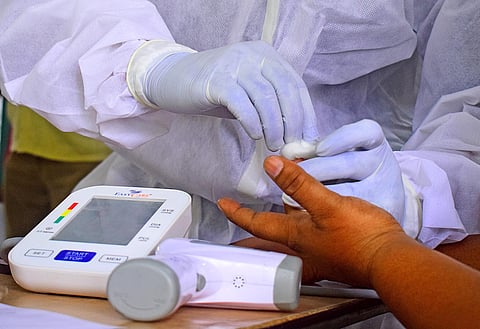 COVID-19 checking at the police commisioner office. (Photo | Pandarinath B/EPS)