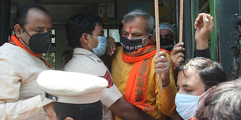 Delhi BJP chief Adesh Guptabeing detained by police at Rajghat during his protest against Kejriwal government for weakening health services. (Photo| Anil Shakya, EPS)