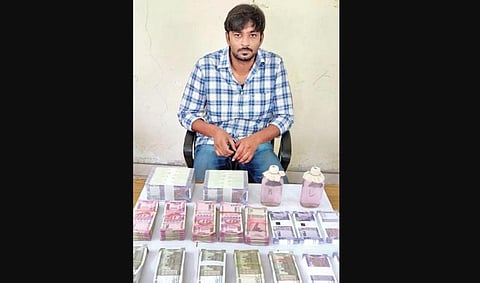The wads of cash seized from the house of Shaikpet Mandal Revenue Inspector, Nagarjuna, on SaturdayThe wads of cash seized from the house of Shaikpet Mandal Revenue Inspector, Nagarjuna, on Saturday.