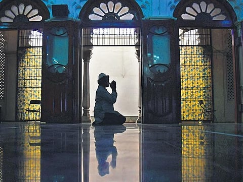 With places of worship opening their doors, a man offers Namaaz at the Jamia Masjid in Bengaluru on Monday | Shriram BN