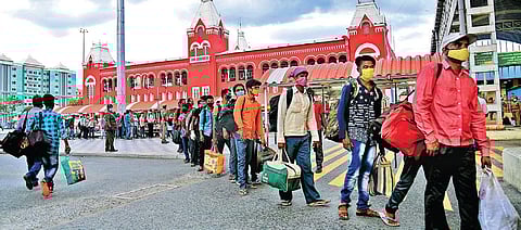 Migrant workers marching towards Central Station with all their belongings to catch the Shramik train on Thursday | martin louis