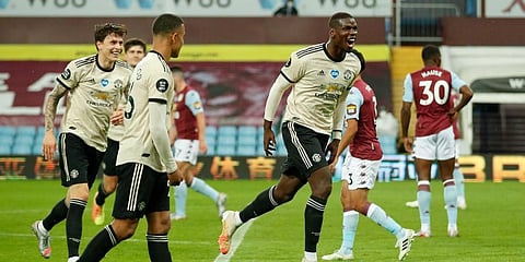 Manchester United's Paul Pogba celebrates after scoring his team's third goal during the English Premier League soccer match against Aston Villa. (Photo | AP)