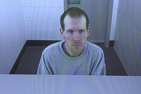 In this March 26, 2020, file image made from video, Brenton Harrison Tarrant appears in a screen via video link in Christchurch, New Zealand. The man who has admitting killing 51 worshippers in a mass shooting at two mosques in Christchurch on March 15, 2