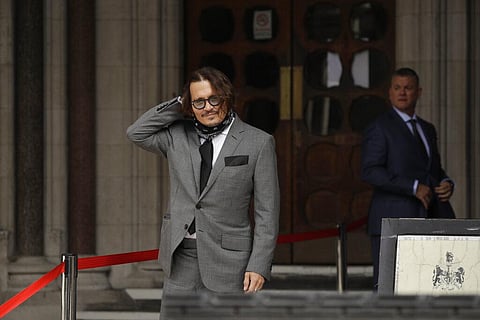 American actor Johnny Depp poses for the media as he arrives at the High Court in London, Monday. (Photo | AP)