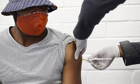 A volunteer receives a COVID-19 test vaccine injection developed at the University of Oxford in Britain, at the Chris Hani Baragwanath hospital in Soweto, Johannesburg, South Africa. (File Photo | AP)