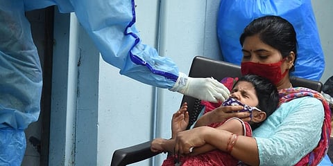 A young girl being tested at Urban Primary health Centre at Banjara Hills in Hyderabad. (Photo | RVK Rao, EPS)