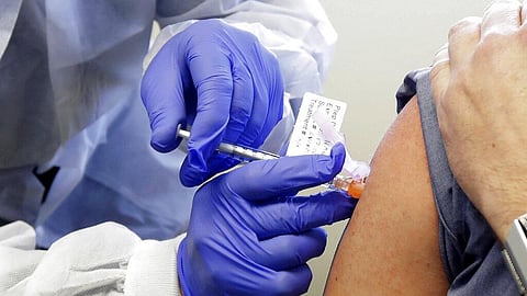 A person receives a shot of the COVID-19 vaccine.