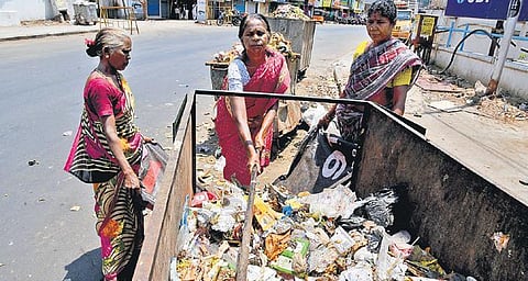 Despite the threat of contracting diseases, sanitary workers are seen without mask or protective gear at Egmore in this file photo. (EPS | R Satish Babu)