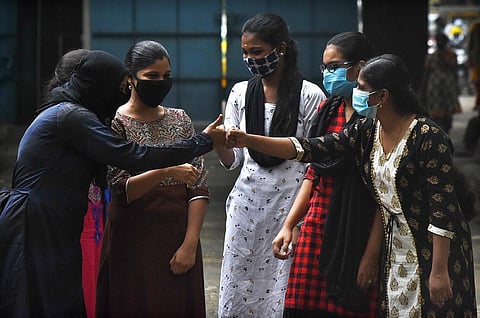 Students of Girl higher secondary school, Ashok Nagar celebrate after knowing their 12th board exam result. (Photo | Ashwin Prasath, EPS)
