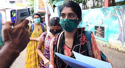 Students entering the Cotton Hills Girls Highschool to attend the Kerala Engineering Architectural Medical (KEAM) exam in Thiruvananthapuram. (Photo | Vincent Pulickal, EPS)