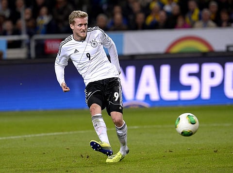 In this file photo taken on October 15, 2013 Germany's midfielder Andre Schurrle shoots to score during the FIFA 2014 World Cup group C qualifying football match Sweden vs Germany.(Photo | AFP)