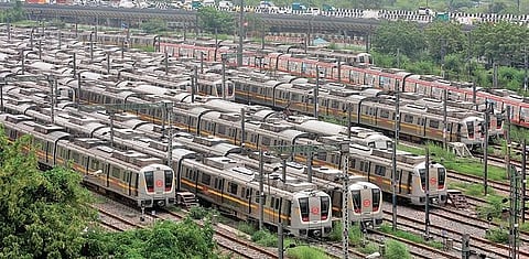 Metro trains stand parked at a yard after services were closed for commuters in the wake of coronavirus pandemic at Timarpur in New Delhi | Shekhar Yadav